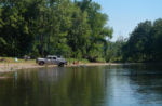 Buffalo River Float Trip by Kayak family parked on gravel bar picnicing