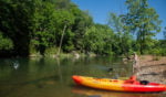 Buffalo River Float Trip by Kayak skipping stones from gravel bar