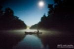 Canoe under a full moon on the Caney Fork River near the dam